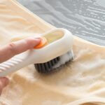small brush or cleaning tool