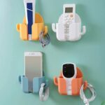 Wall-mounted mobile phone holder or stand