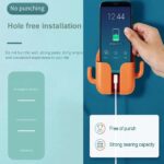 Wall-mounted mobile phone holder or stand